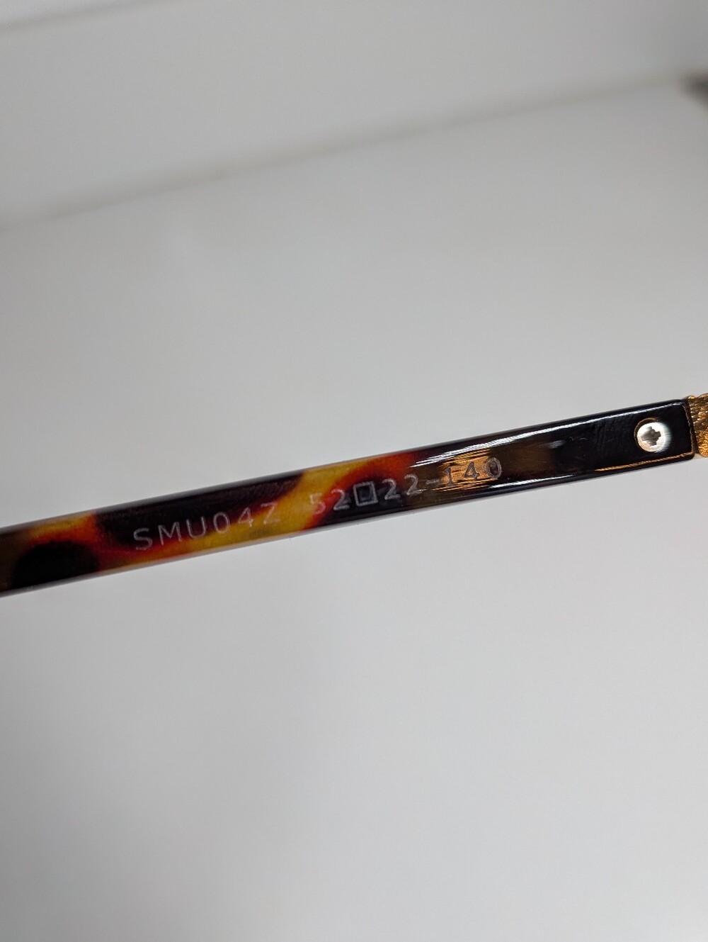 Miu Miu Tortoiseshell Oval Sunglasses in Brown - Picture 7 of 11